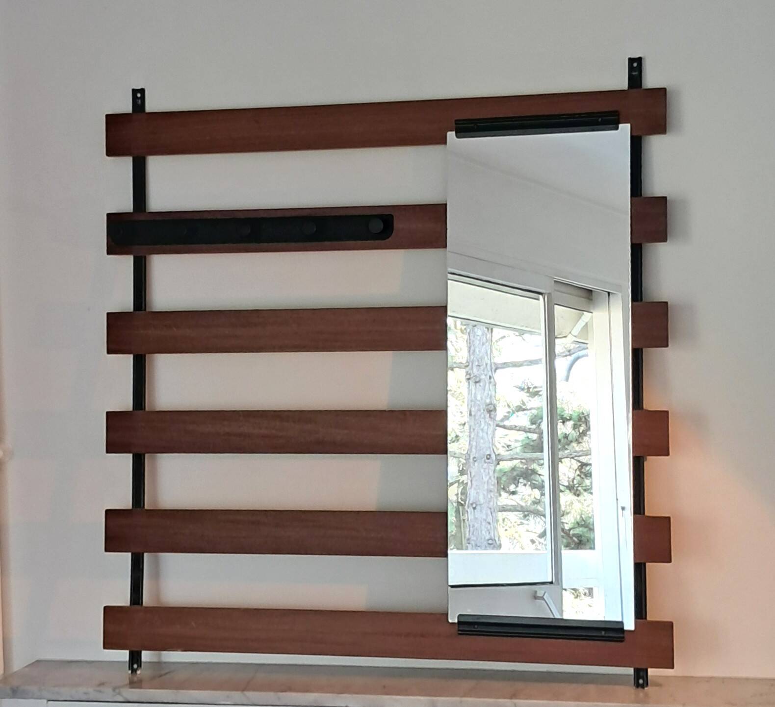 Vintage teak wall coat rack with 5 hooks and mirror.