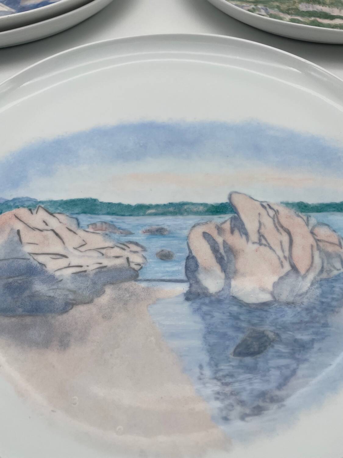 Hand painted porcelain plate with landscape decoration