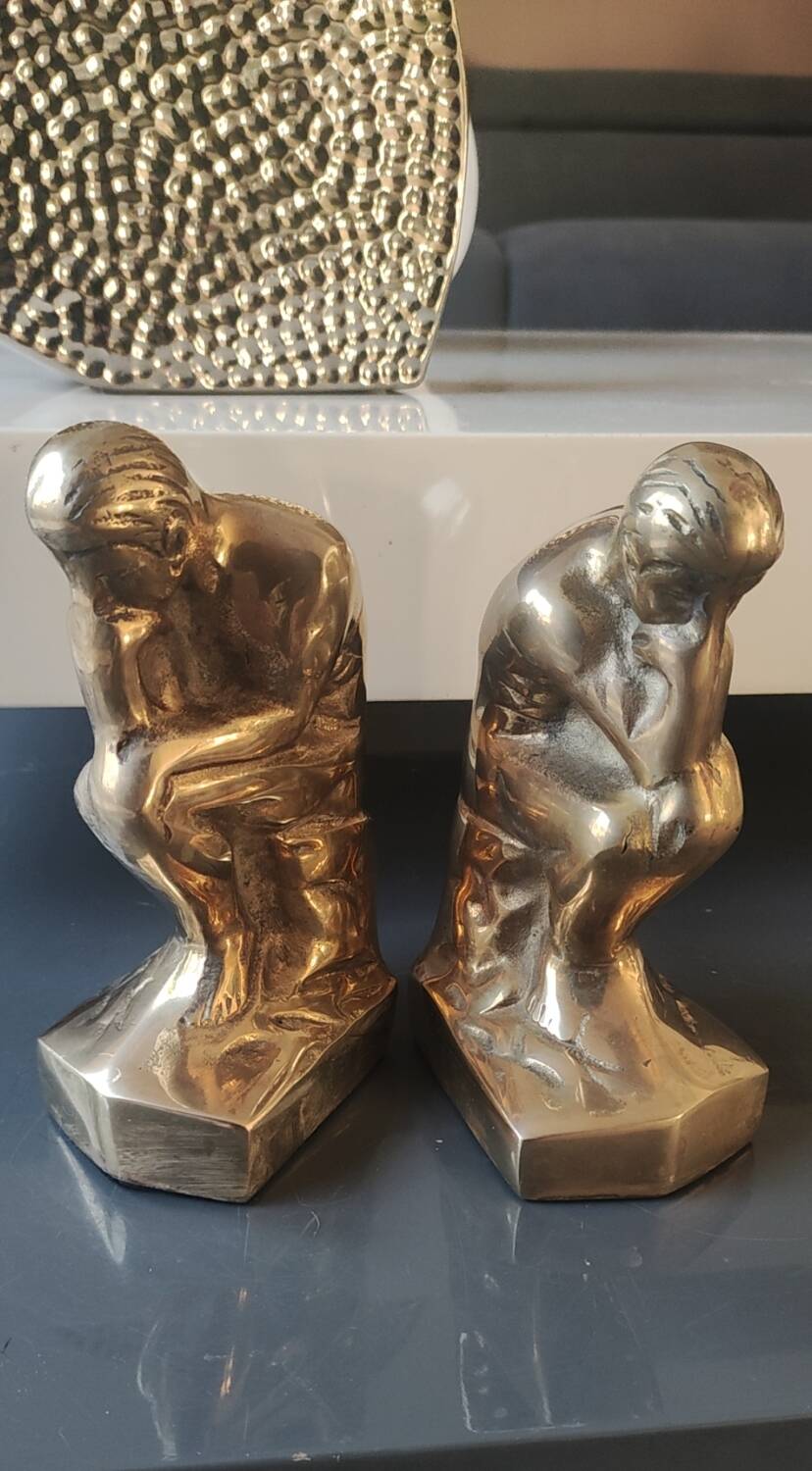 Pair of bookends inspired by Rodin's The Thinker. In gilt bronze