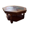 Octagonal wooden coffee table on stone