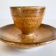 Trio of vintage ceramic and wood egg cups