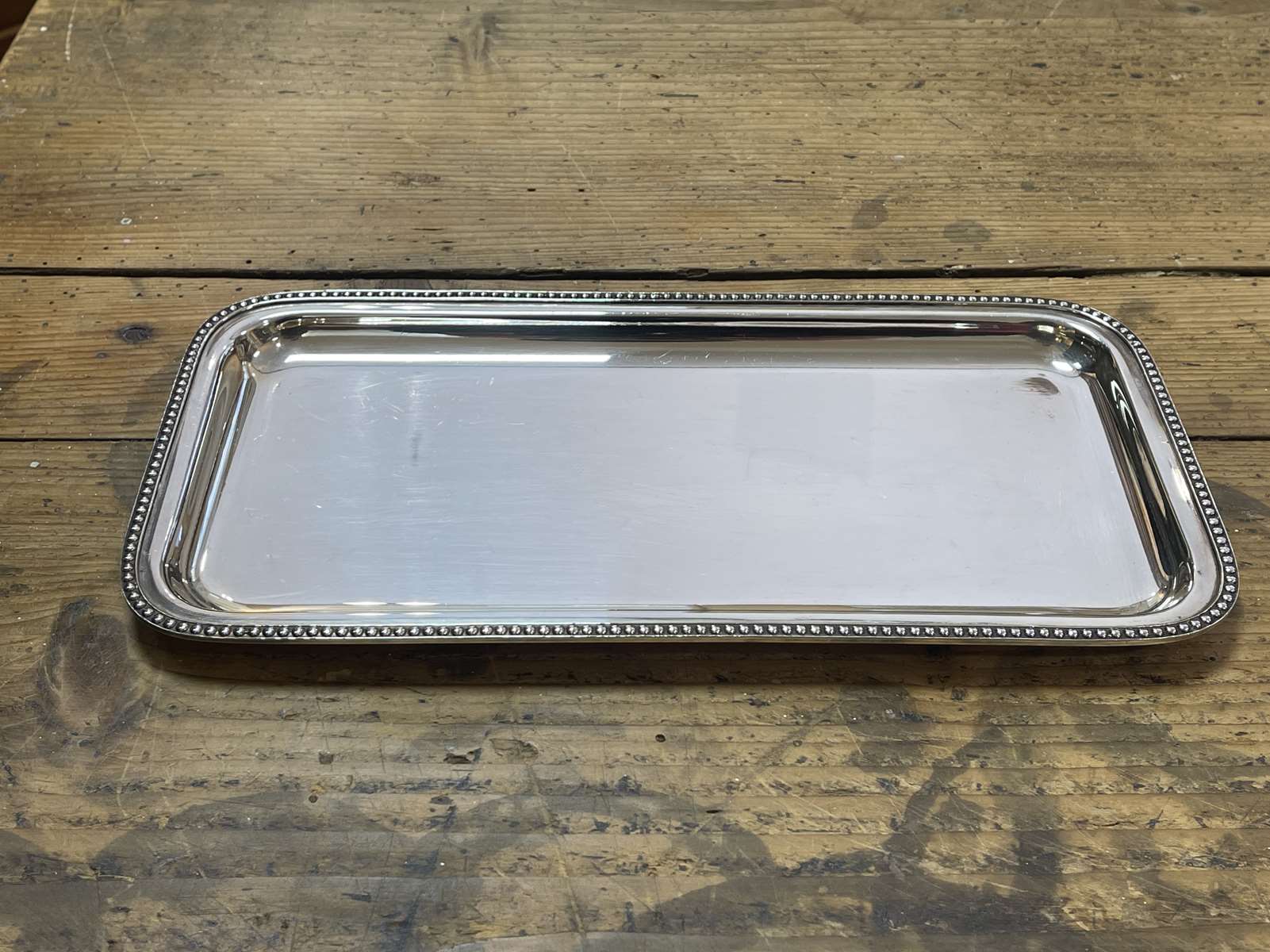 Small rectangular and beaded silver metal top