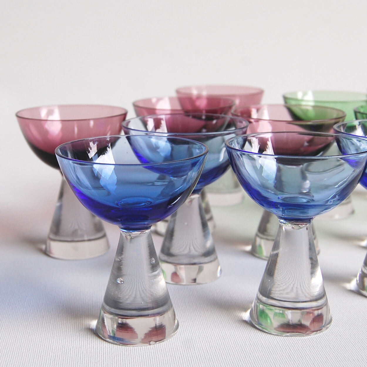 Set of 12 alcohol glasses in colored glass 1950s