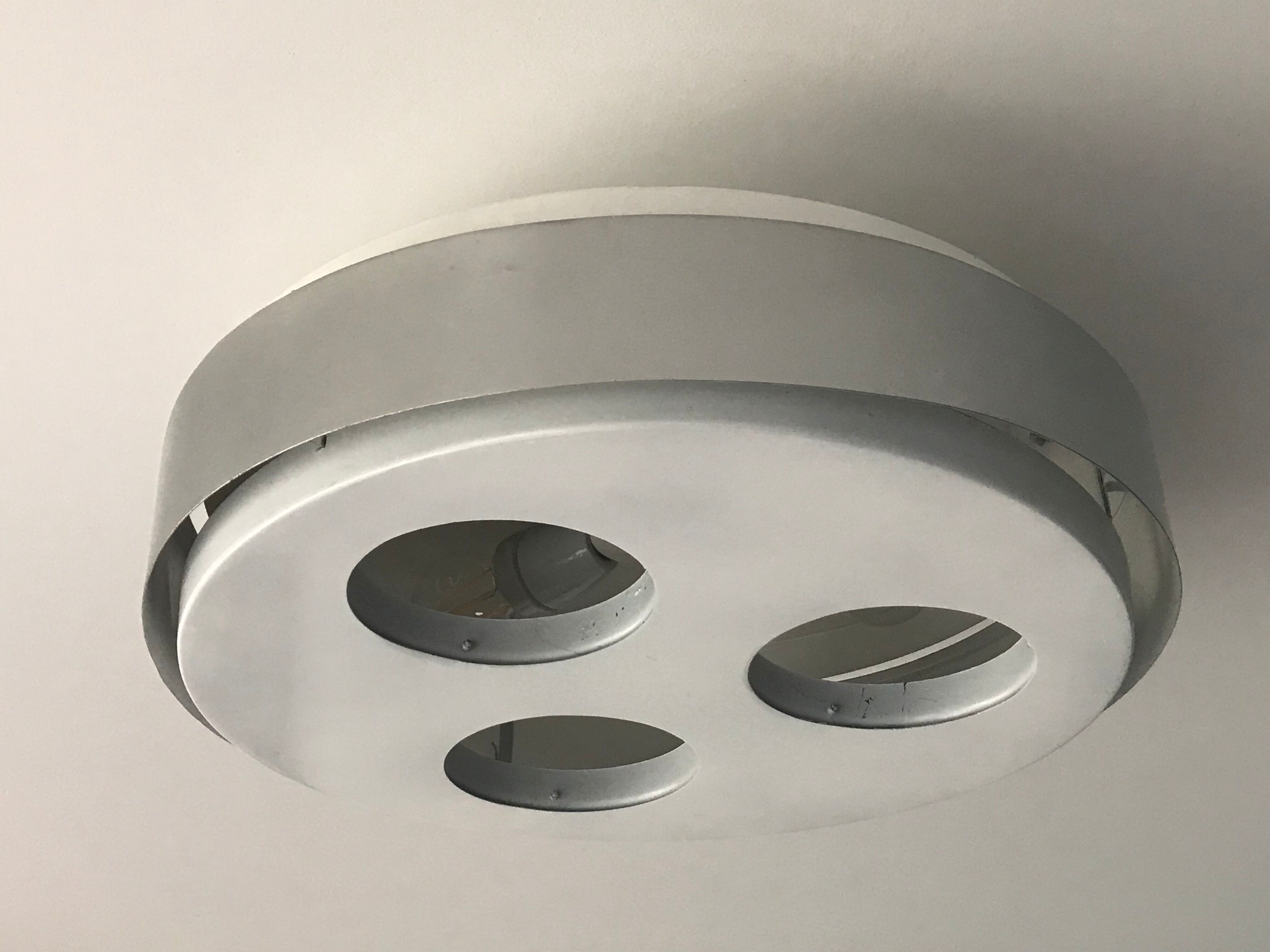 Round ceiling lamp white and grey Raak Holland