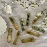 Set of 9 vintage resin knife holders including shell and seahorse
