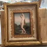Pretty golden frame with curved glass