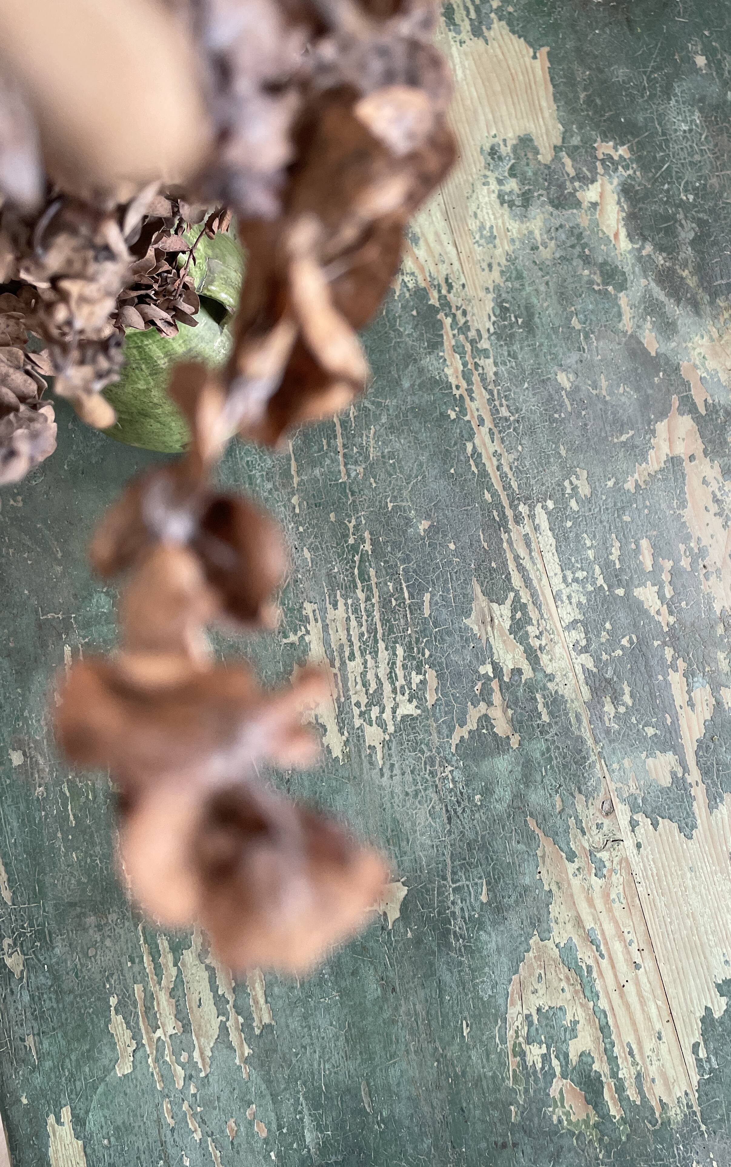 Vintage farm table with spindle legs.