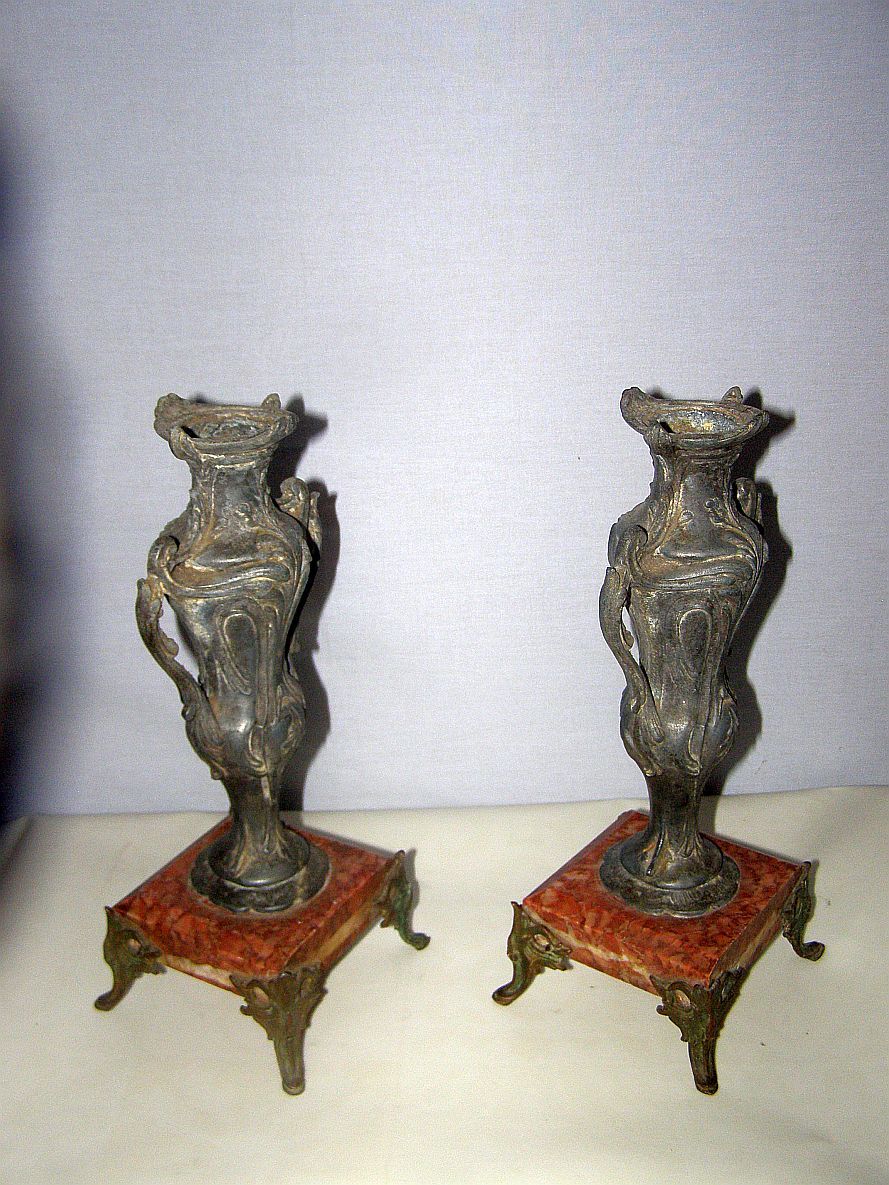 2 ancient amphorae in regulation on marble base