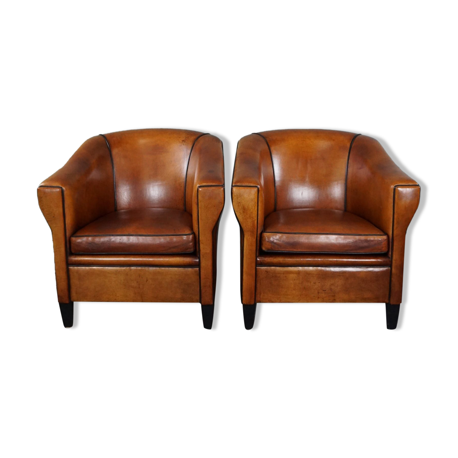 Set de 2 fauteuils Art Déco en cuir de mouton passepoil noir