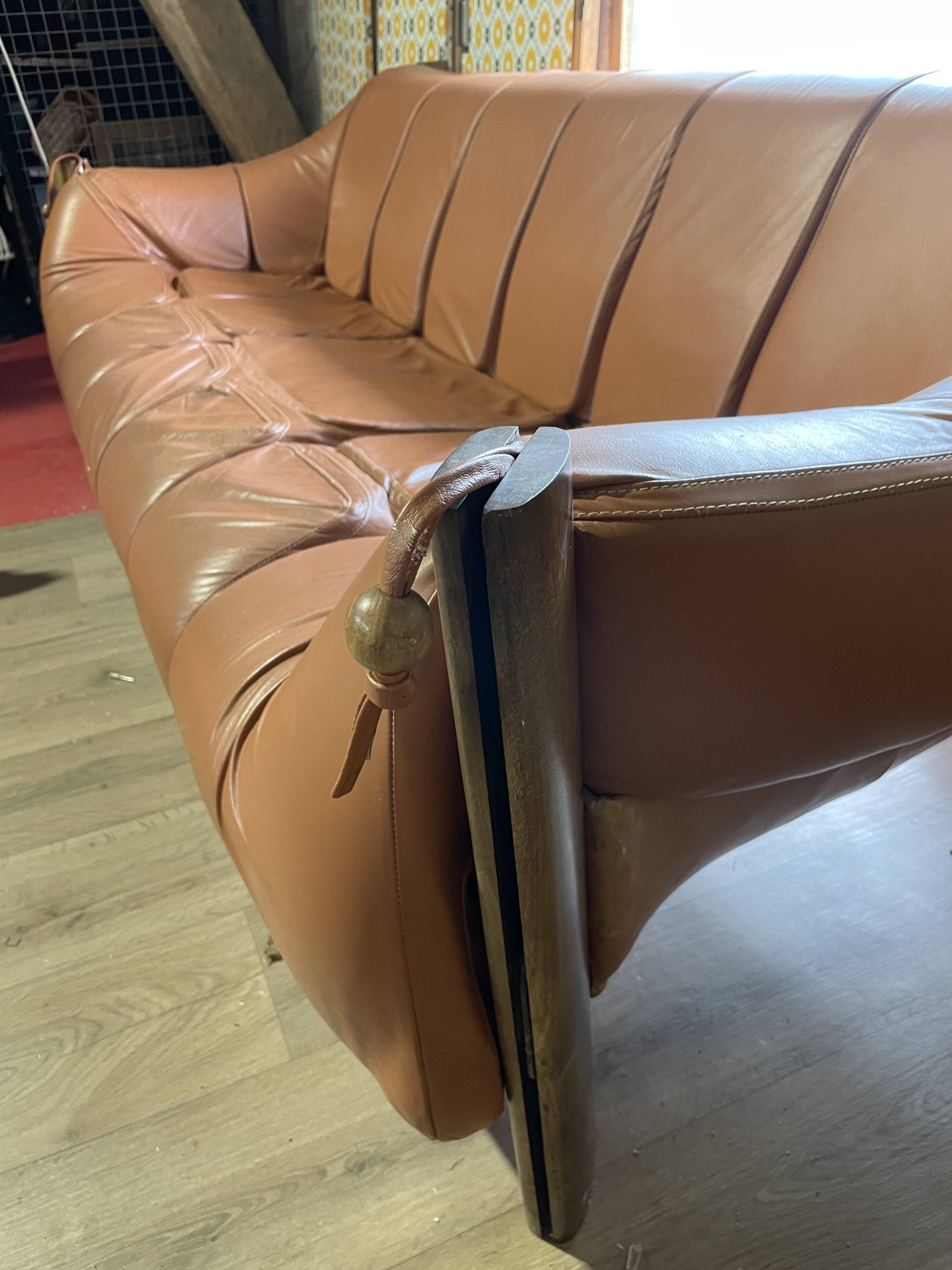 Percival lafer mp-211 sofa set with two armchairs and an ottoman in leather.