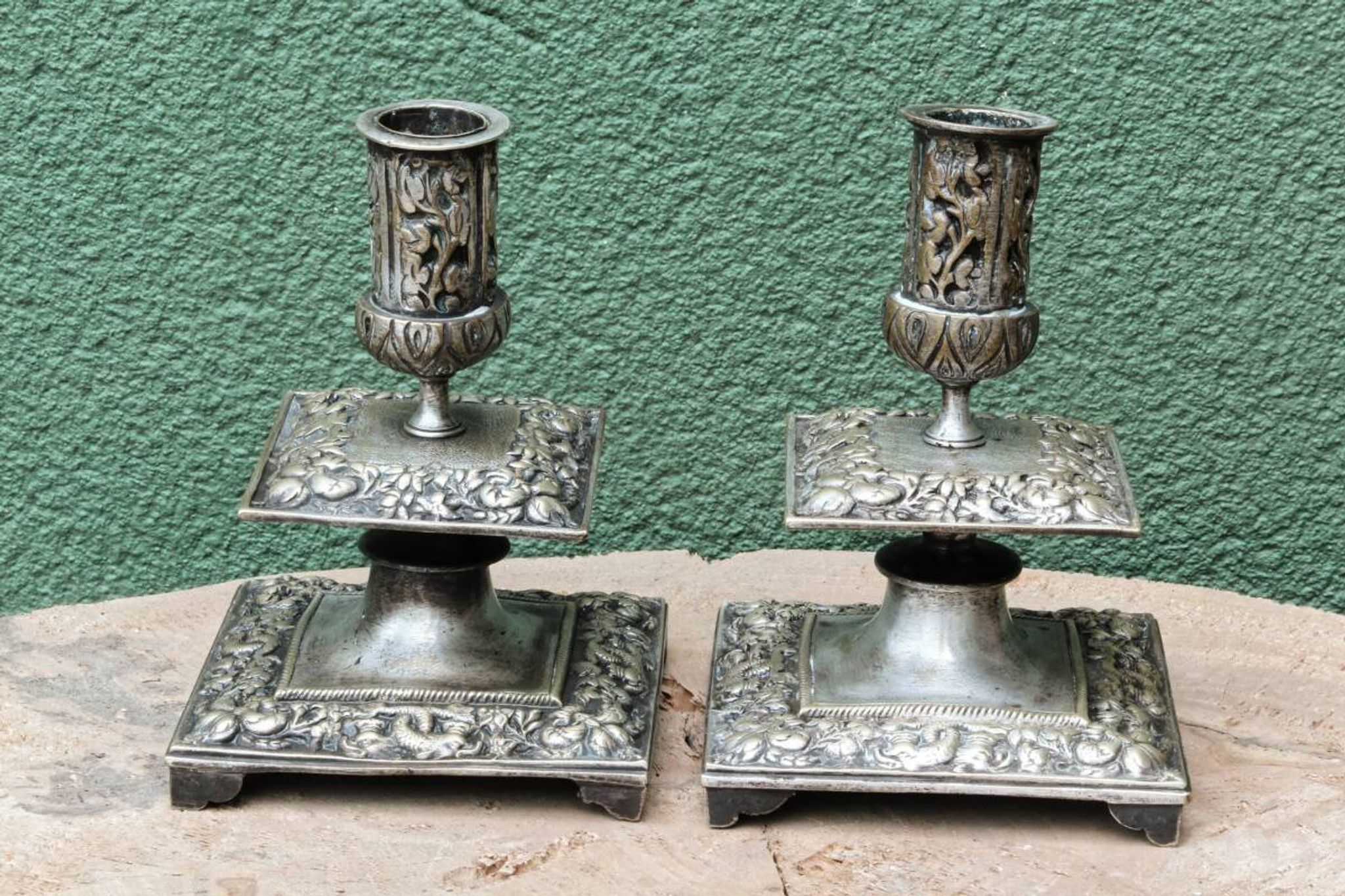 Pair of square candlesticks in patinated bronze