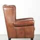 Large sheepskin wingback armchair in timeless English style
