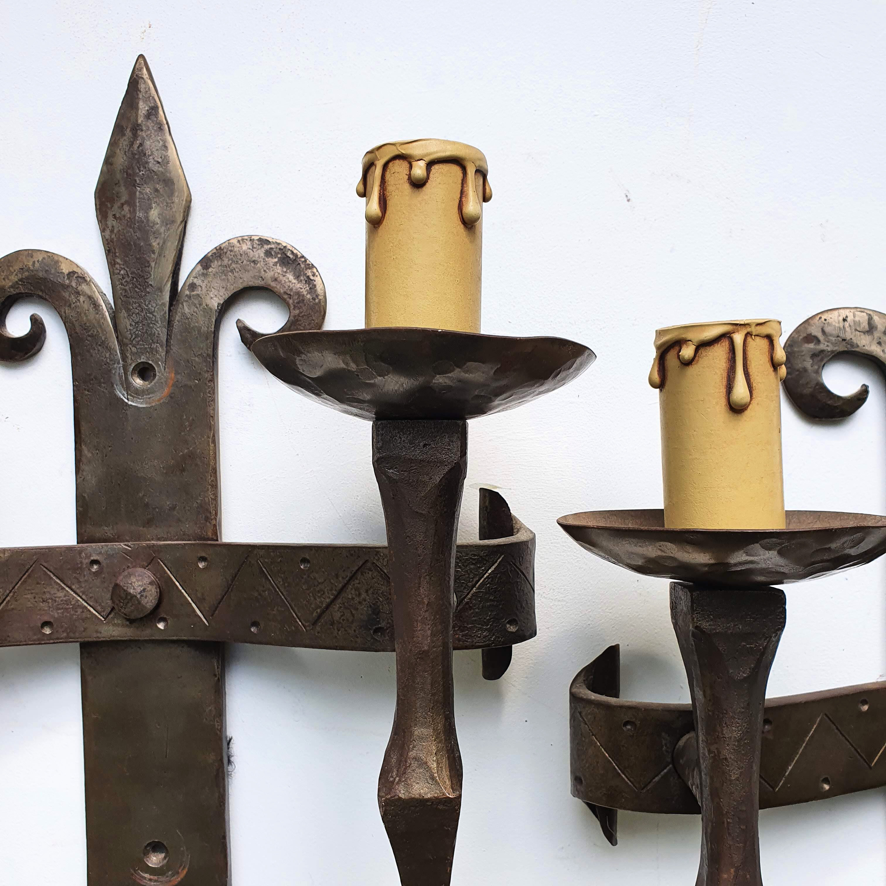 Duo of wrought iron wall lamps Atelier Marolles