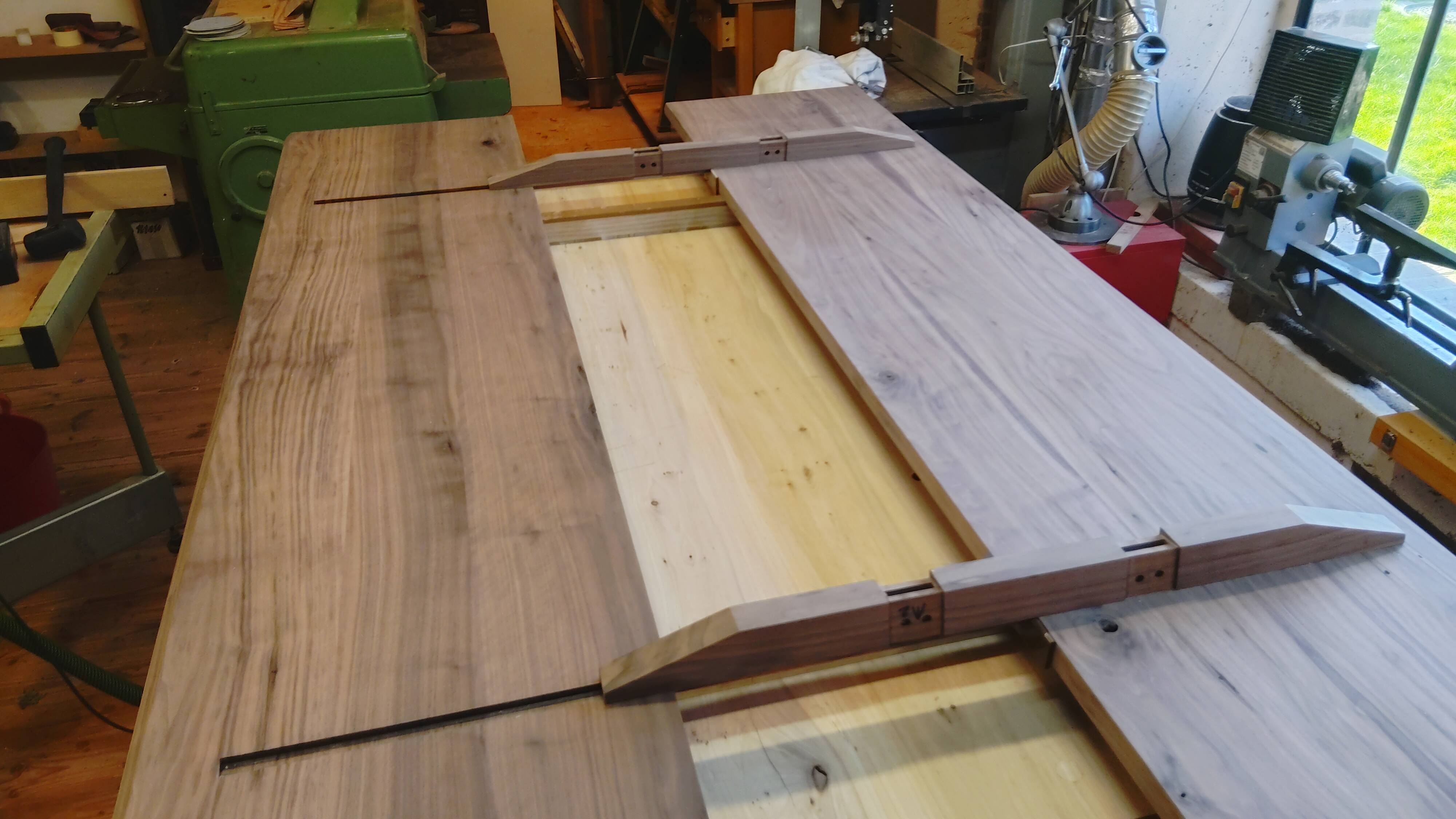 Exceptional dining table in solid walnut.