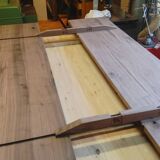 Exceptional dining table in solid walnut.