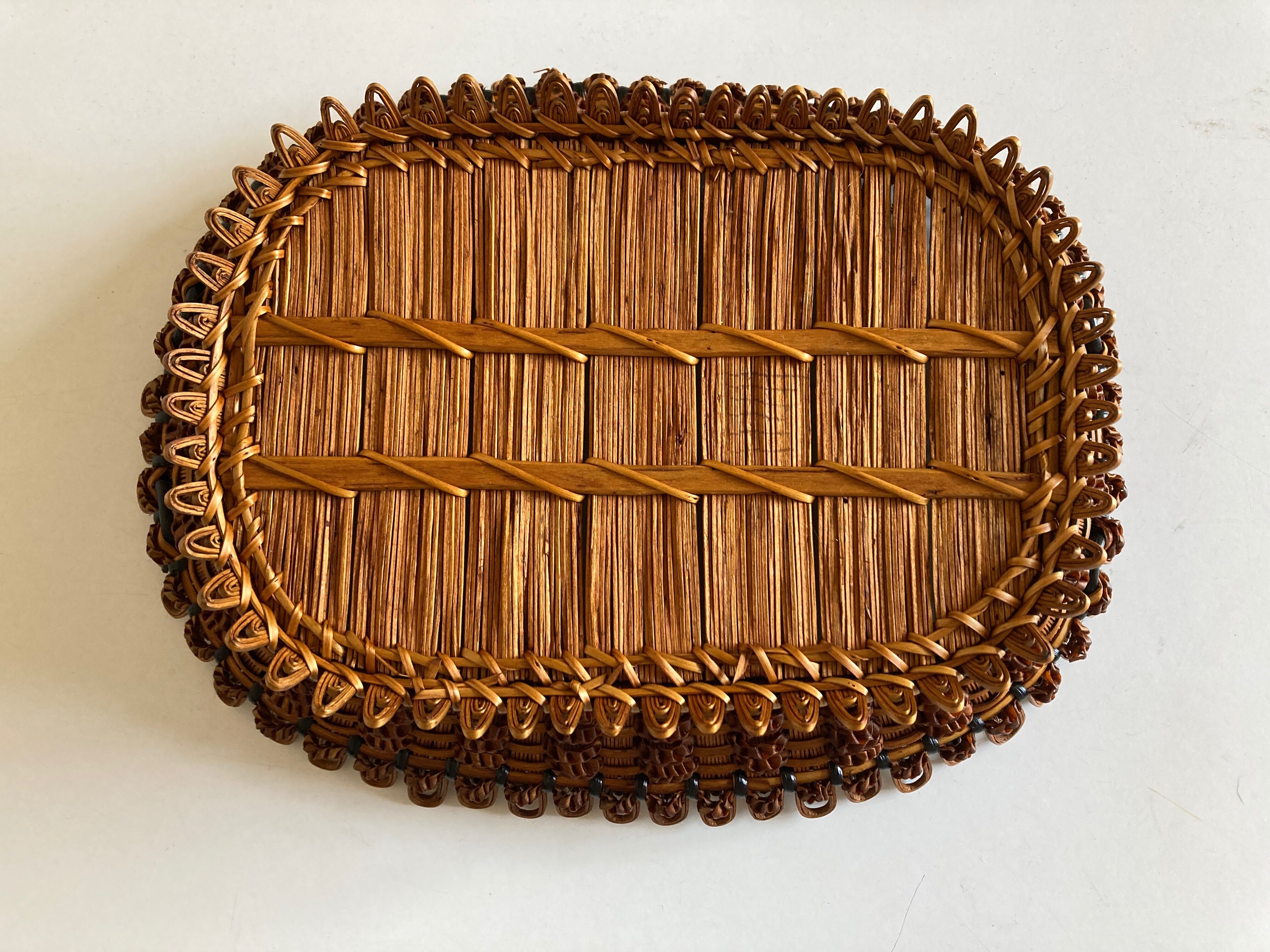 19th-century wicker basket embroidered by folk artisans.
