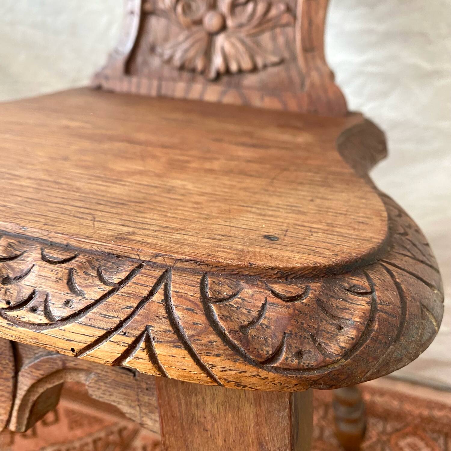 Antique Alsatian chair in carved wood