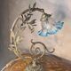 Bronze and brass lamp, transparent and blue glass shade.