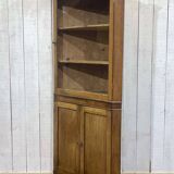 19th-century English corner cabinet in oak, mahogany, and fir.