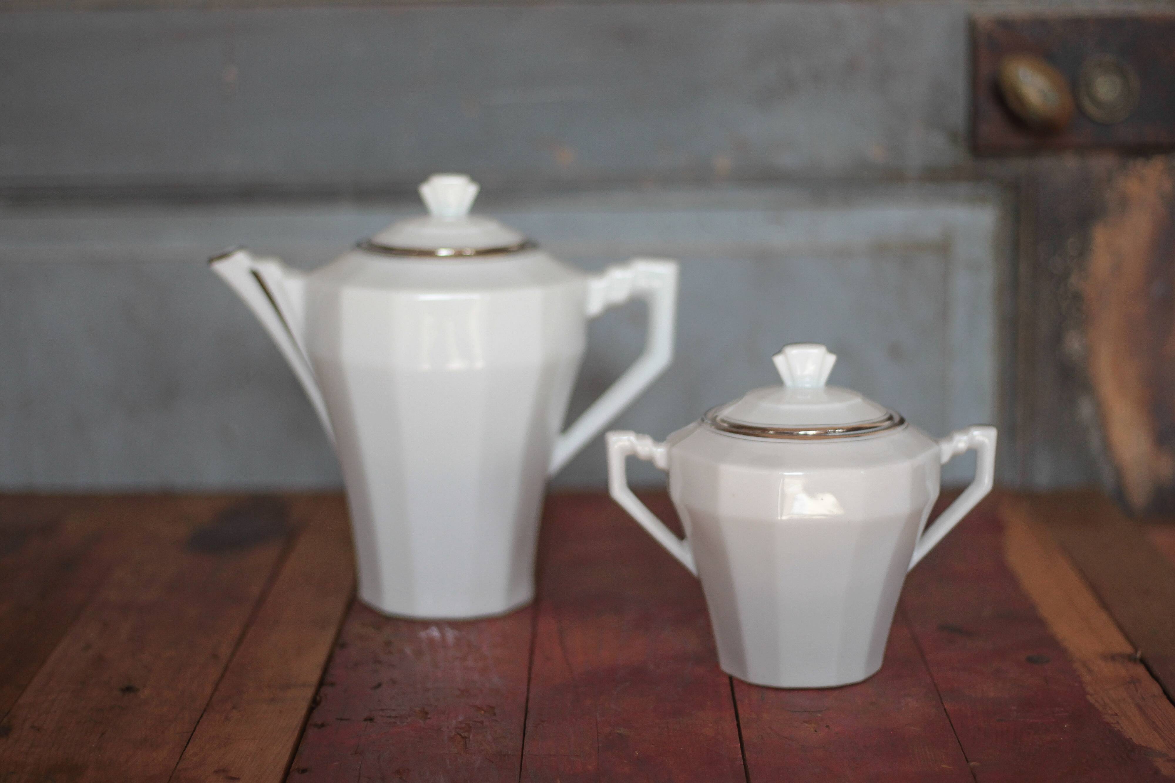 Art Deco porcelain teapot and its sugar bowl, porcelain coffee pot, kitchen.