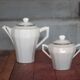 Art Deco porcelain teapot and its sugar bowl, porcelain coffee pot, kitchen.