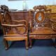Pair of Asian armchairs in carved wood with mother-of-pearl inlays.