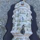 Wall fountain and its basin in Moustiers earthenware, handmade decoration.