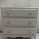 1950s commode enhanced in verdigris.