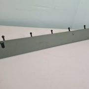 Wooden coat rack with cast iron hooks