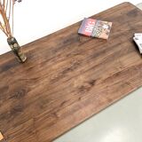 Modernist coffee table in solid elm, cylindrical pine base, 1970s.