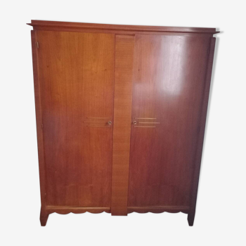 Armoire en bois et laiton