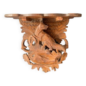 Black Forest carved wooden wall console, harness with wolf decoration