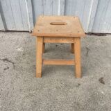 Small low wooden stool