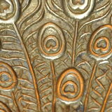 Brass pocket with peacock decoration