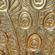 Brass pocket with peacock decoration