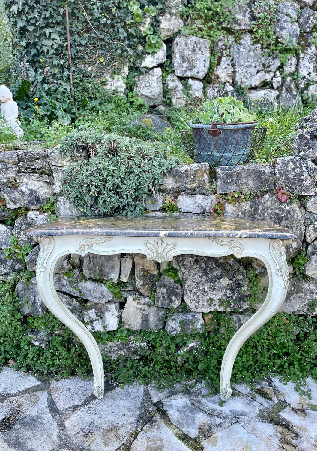 Wall console in painted, carved and molded wood in Louis XV style.