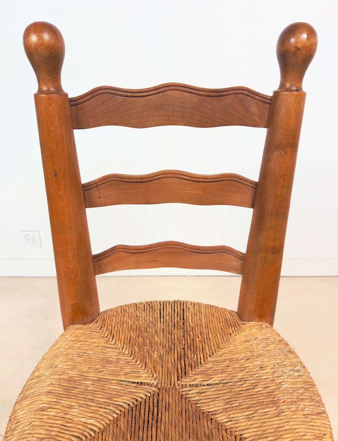 Vintage wooden chair with rush seating