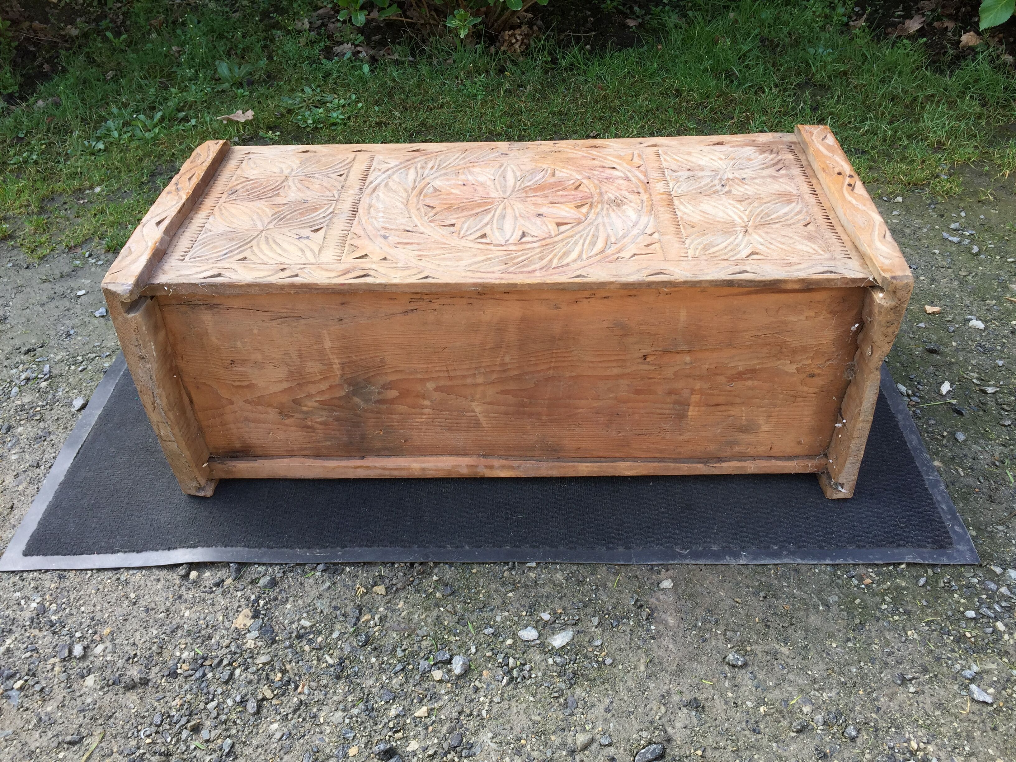 Ancient brutalist chest carved wind rose