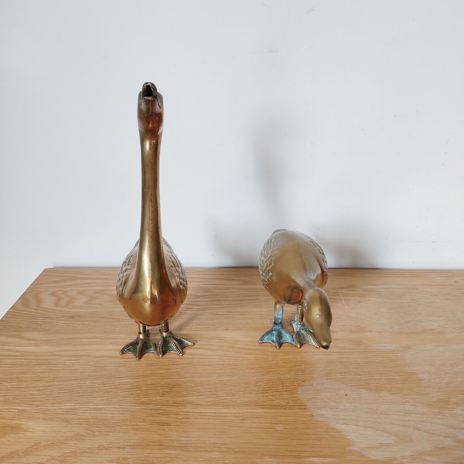Pair of brass geese