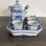 Antique Chinese tea set decorated with dragons.