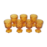 7 amber stemmed glasses