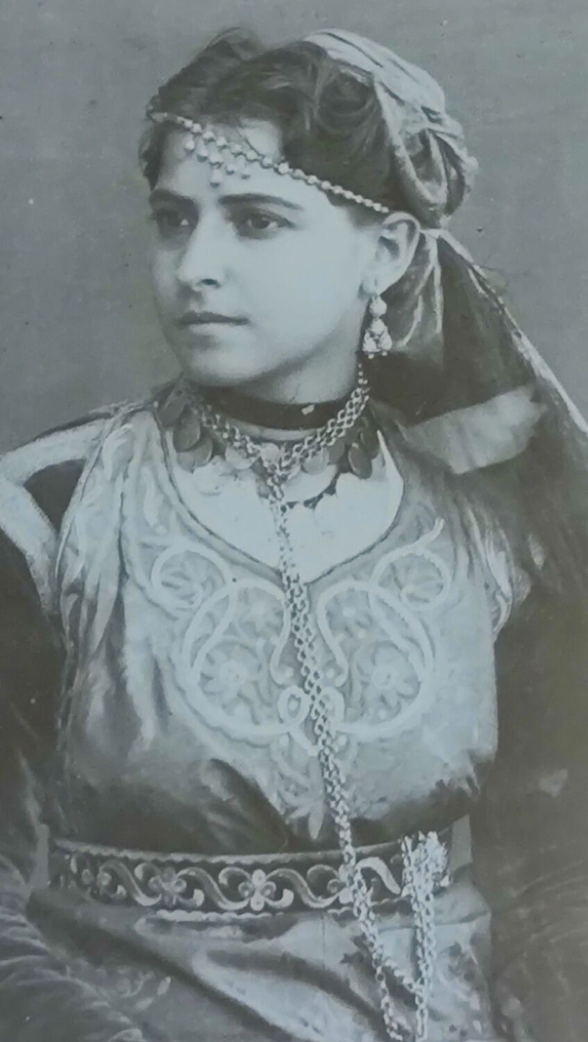 Old wooden frame and bronze ornament