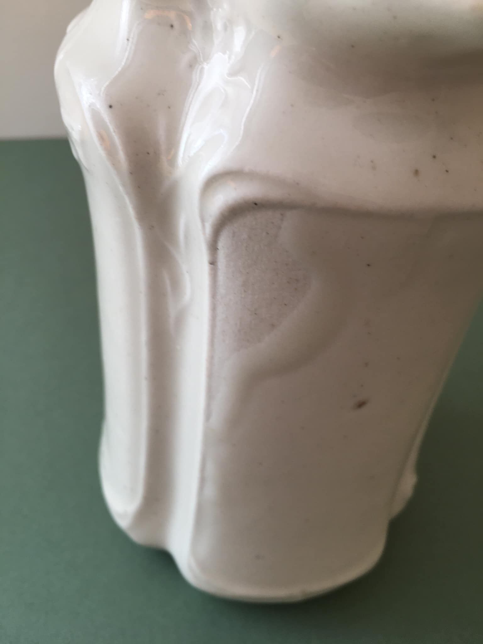 Antique ivory-coloured porcelain vase/pitcher