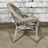 Vintage white rattan armchair