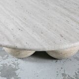 Circular travertine coffee table