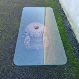 Coffee table with carved wooden base from India, glass top
