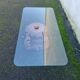 Coffee table with carved wooden legs from India, glass top.