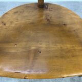 Chalet-style carved wooden tripod armchair