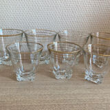 Set of vintage glasses with golden edging