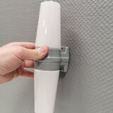 Bathroom lamp with light gray ceramic base,  and milky white opal glass.